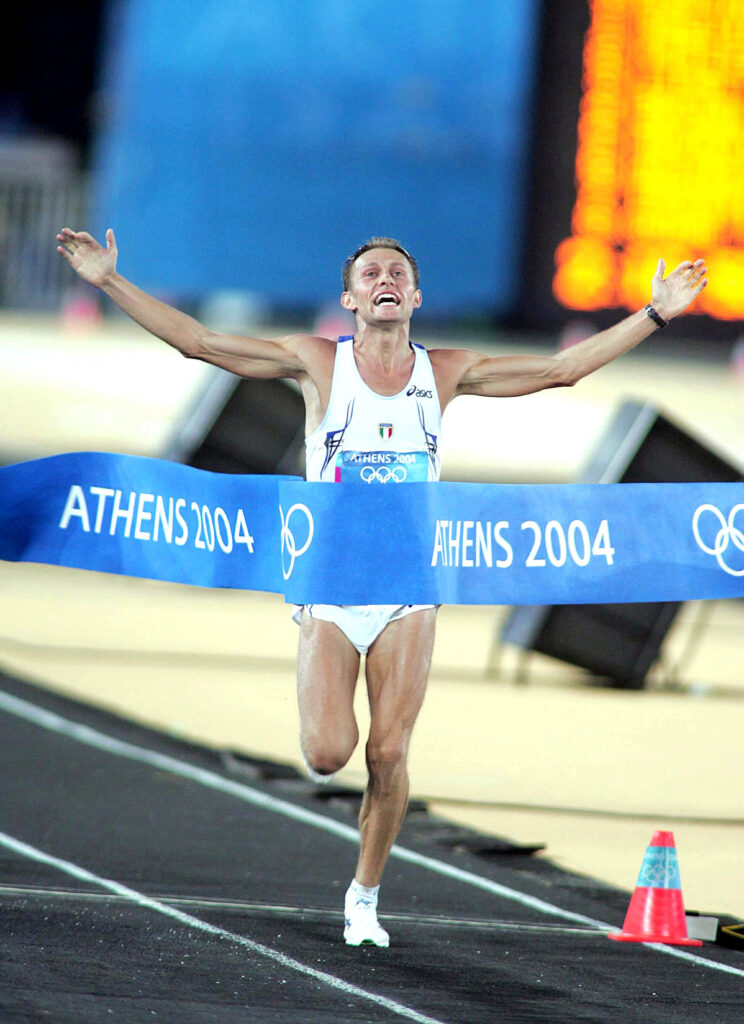 Atene (Grecia) 29-08-2004 XXVIII Olimpiadi Estive Maratona Stefano Baldini vince la medaglia d'oro Foto Omega/Colombo